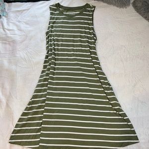 Light green/ white striped dress. New with tags. Super cute summer dress. Size L
